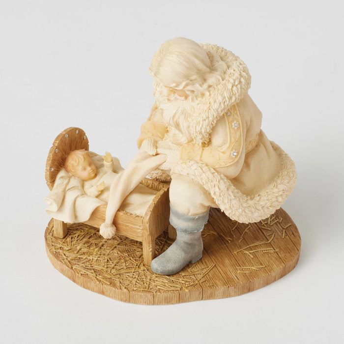 Santa with baby Jesus figurine