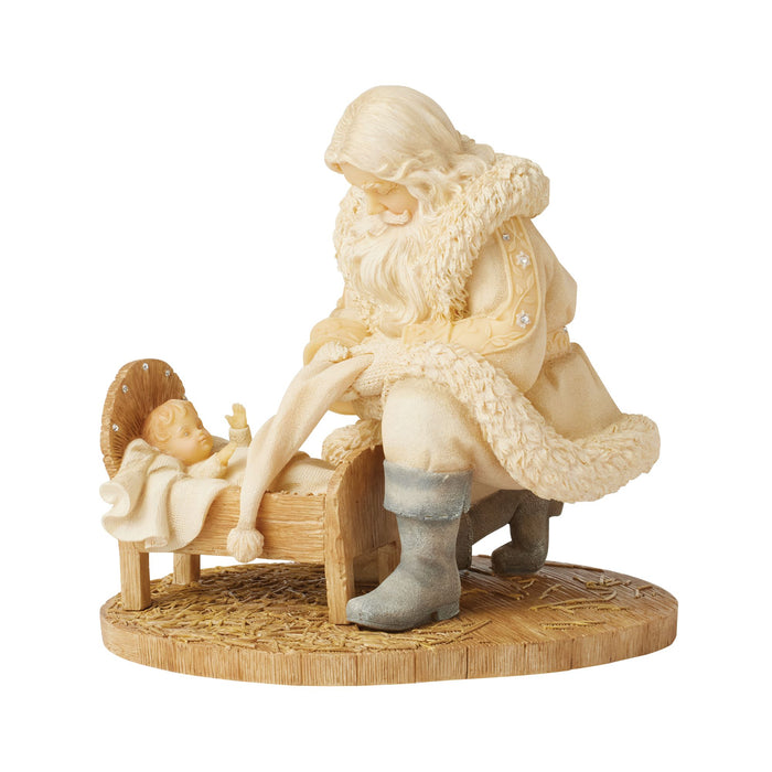 Santa with baby Jesus figurine