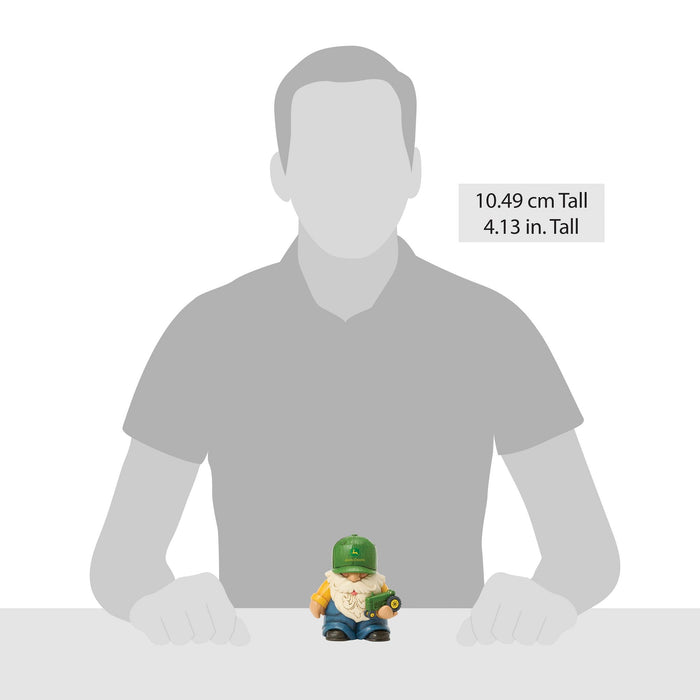 Farmer Holding Deere Tractor