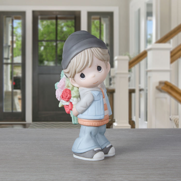 Boy Holding Flowers Figurine