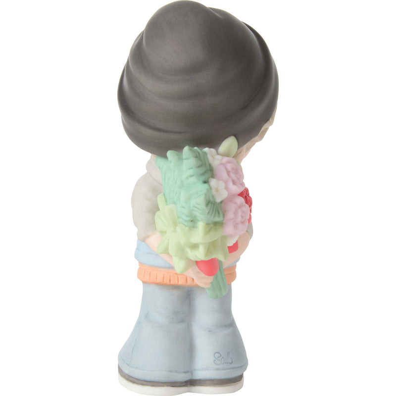 Boy Holding Flowers Figurine