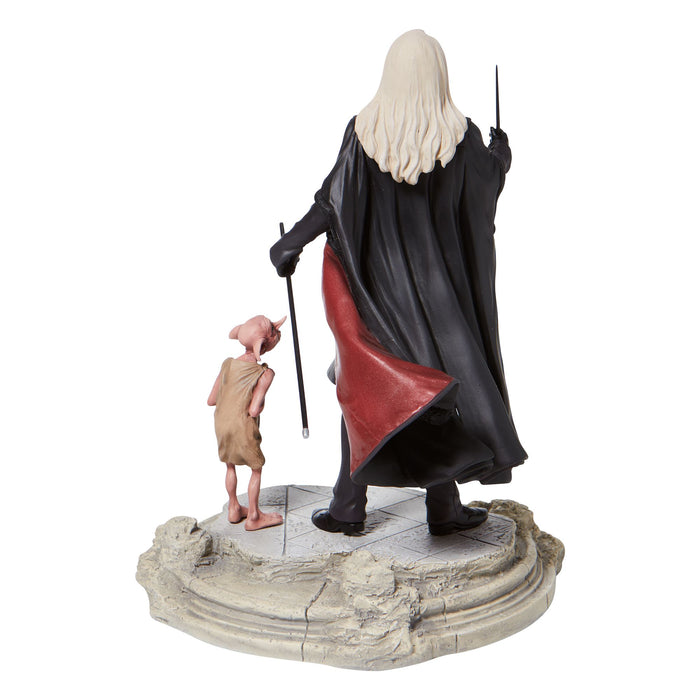 Lucious Malfoy with Dobby