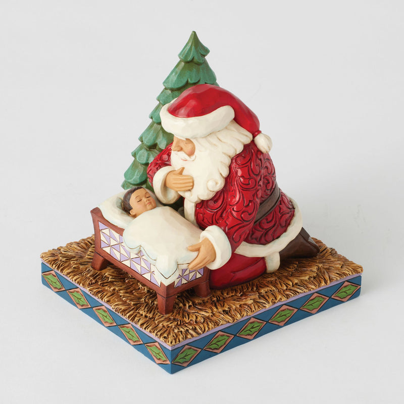 Santa Kneeling over Baby Jesus
