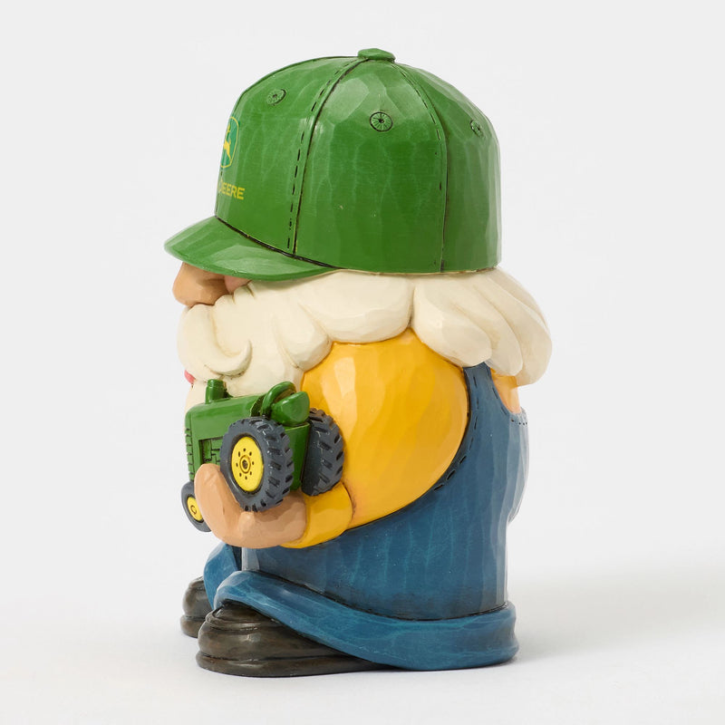Farmer Holding Deere Tractor