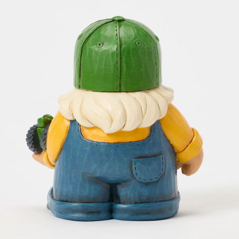 Farmer Holding Deere Tractor
