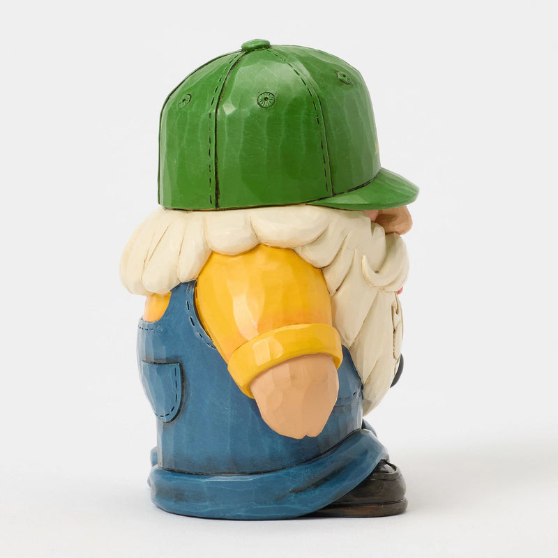Farmer Holding Deere Tractor