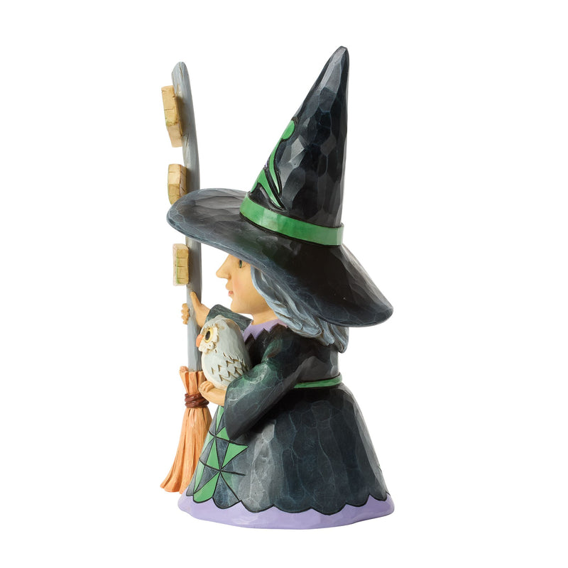 Good Witch Next to Broom Sign