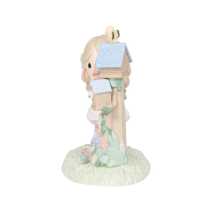 Girl with Birdhouses Figurine