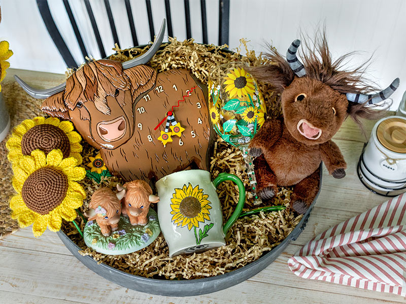 Allen Designs Cow clock, plush, and Our Name is Mug flower mugs basket